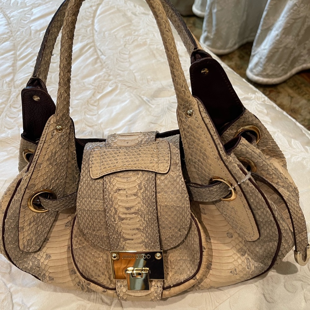 Top of the line Jimmy Choo snakeskin. Immaculate condition!